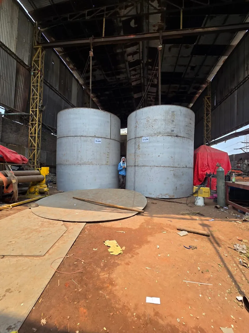 Two large tanks being fabricated in the workshop